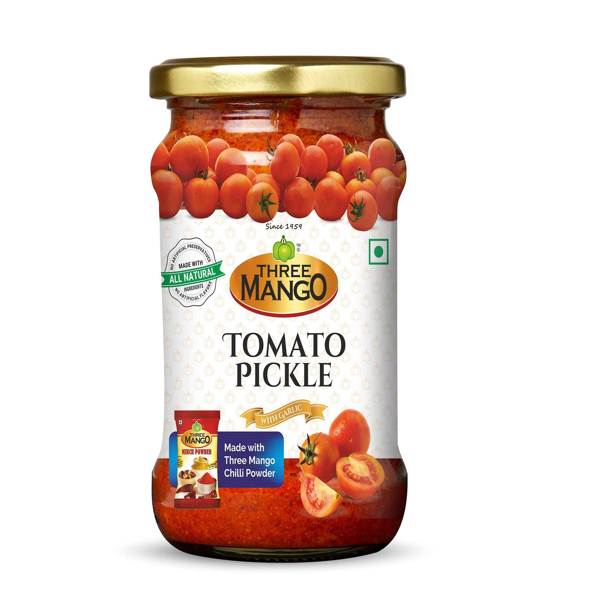 Three Mango Tomato Pickle front view jar with fresh tomatoes image and chili powder label