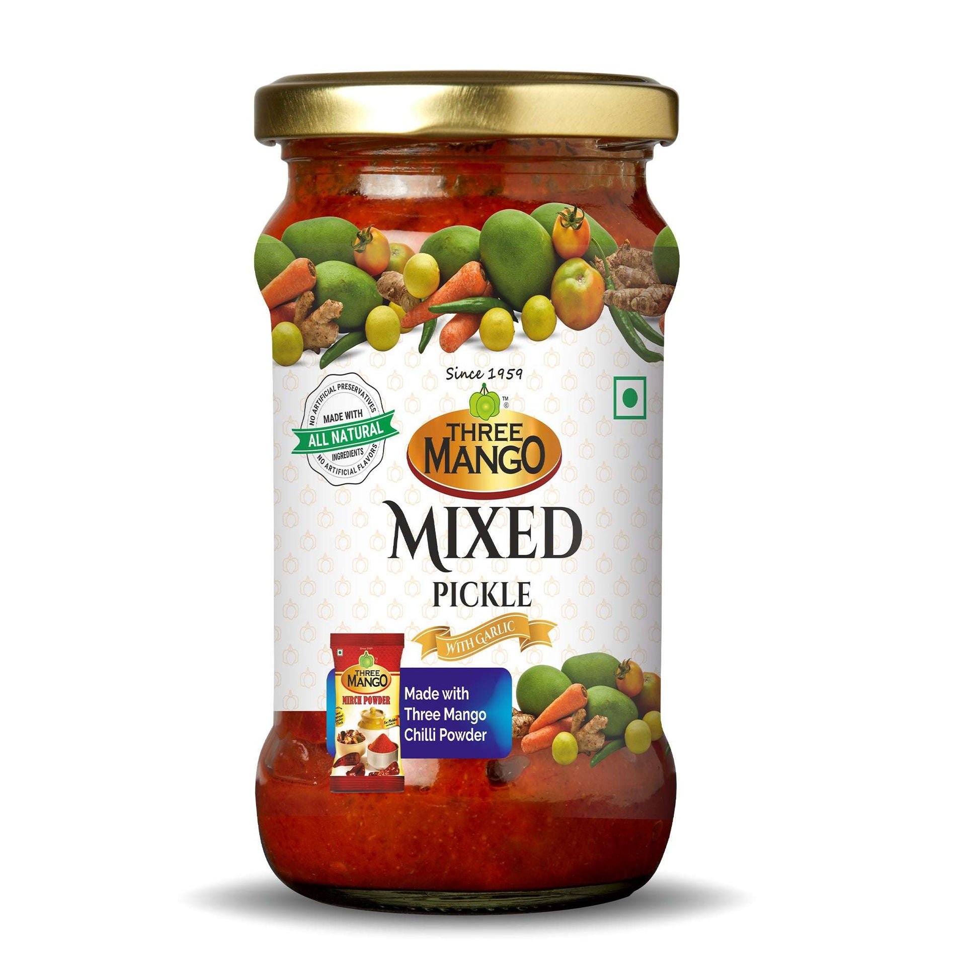 Three Mango Mixed Pickle jar with garlic, featuring images of mangoes, carrots, limes, and spices on all natural labeled packaging, made with Three Mango chilli powder.