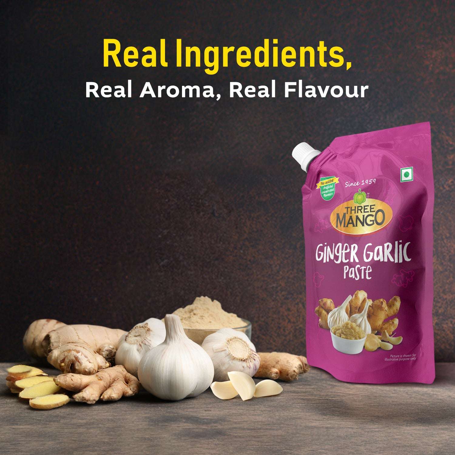 Three Mango Ginger Garlic Paste displayed with real ginger roots, garlic cloves, and powder, emphasizing authentic aroma and flavour.
