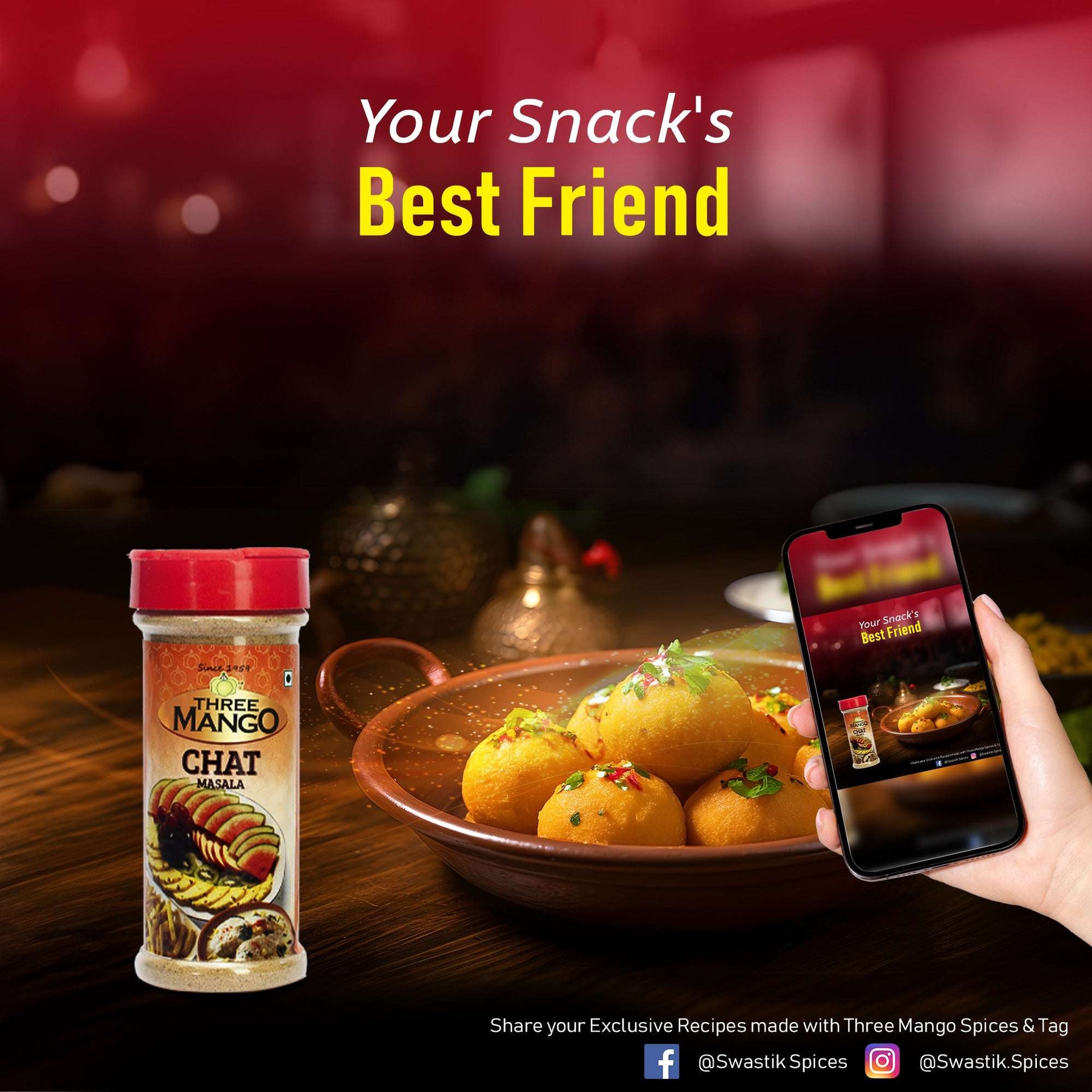 Three Mango Chat Masala bottle with a plate of savory snacks and a mobile phone, showing it as the perfect companion for enhancing snack flavors.