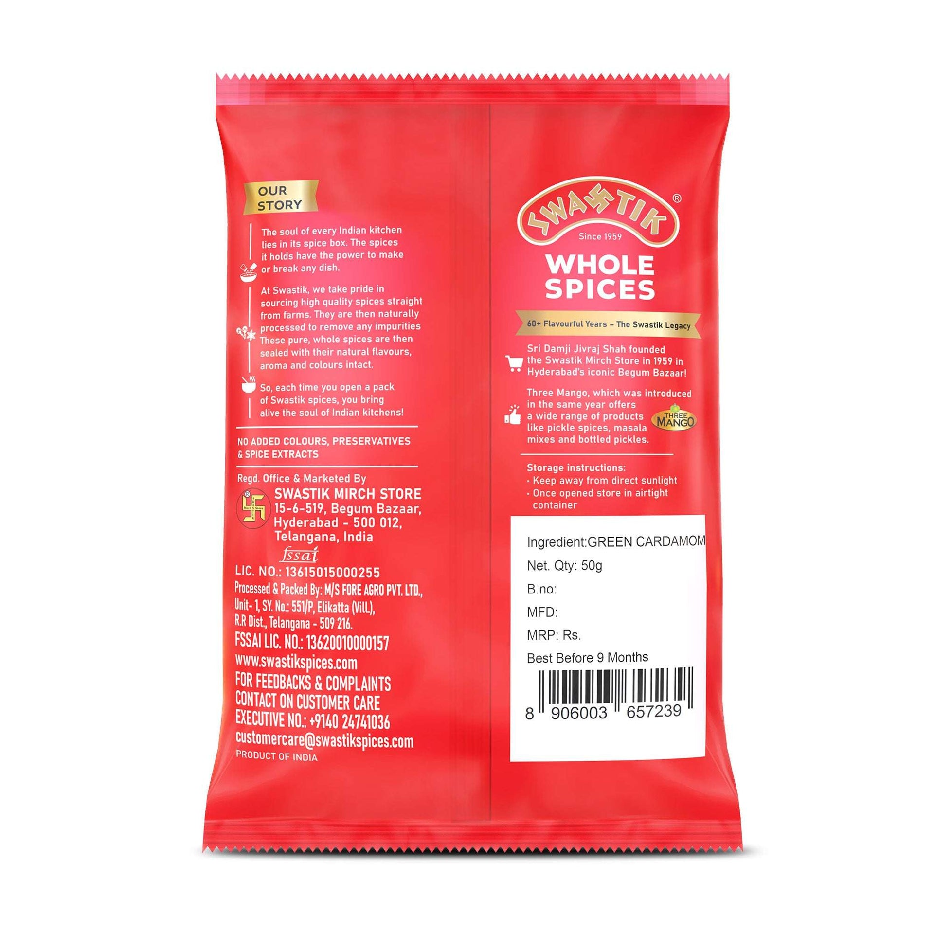 Swastik Green Cardamom 50g pack back view showing brand story, manufacturing details, storage instructions, barcode, and ingredient listing.